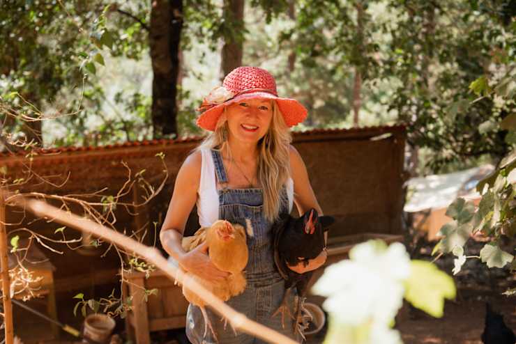 host-holding-two-chickens