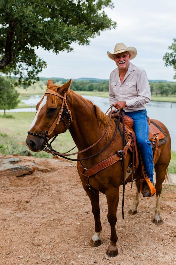host-on-horseback-by-pond
