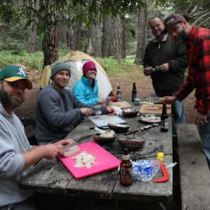 Van Damme is a popular spot for ab (abalone) divers. Prepping fresh abalone in camp the dudes pulled out of the ocean earlier that day at Van Damme beach.