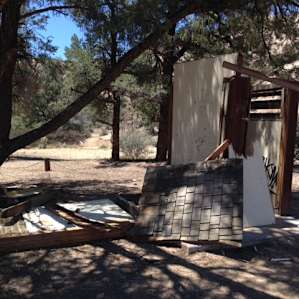Condition of the bathroom at Nettle Springs CG as of 5/2/15. Los Padres NF website says that the CG is open, but there are no alerts or warnings about its unusable, unsafe condition. Called Mt. Pinos Ranger District, they said it is being decommissioned.