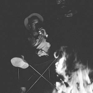 people campfire camper