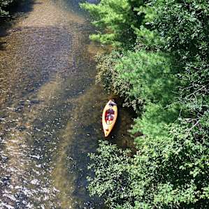 Standing on the railway bridge downstream