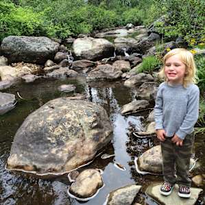 Beautiful Salmon Creek at the campground. Don't mind my kids goofy "cheese!" smile.