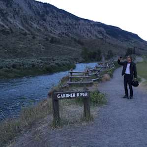 Near the hot springs where a cold river merges with natural, steaming-hot spring.