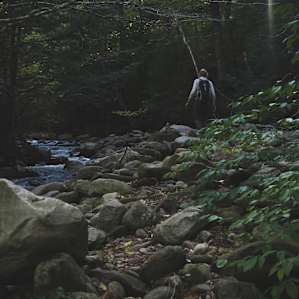 River navigating on the way to Mt. Moosilauke! Make sure you have hiking poles for river crossings :)