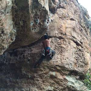 that man is a beast climbing out of that roof