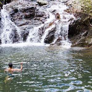 The swimming hole is worth staying for a few nights. You can scramble up the waterfall's side and continue exploring, or follow the creek down for a small hike.