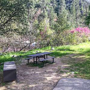 Big bear box and wooden picnic table.