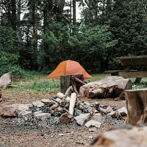 A fire pit for communal use to stay warm and cozy.