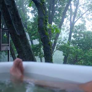 Misty morning tub and coffee with a view