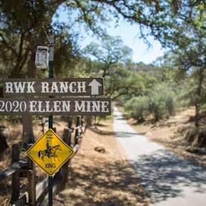 Follow this paved road up, take a left onto the dirt road, follow to the gate!