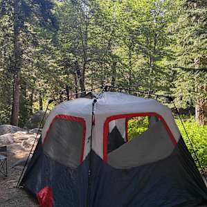 Fit a Coleman 6 man/instant and down by picnic table there was room for another 2-4 man. Beware. In Summer, there are an abundant amount of bugs, mosquitos, etc down by the creek bed. Use a fire in day to smoke them away.