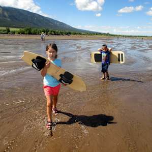 Rent your sand boards at the general store a few miles outside the park