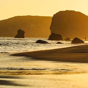 Fishing at sunset at Harris Beach