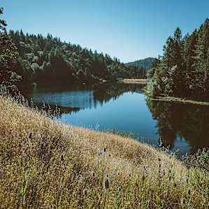 After the wood bridge you are free to pitch your tent at any flat spot you want. You will be camping alone on this side of the reservoir with incredible views towards the east.