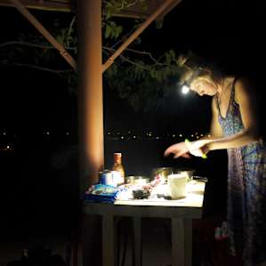 Evening dinner preparations made easier with the help of the robust cutting board table.