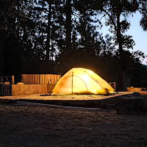 The area is normally clear but there were pallets (for an upcoming wedding the ranch is hosting) that I was able to set up my tent on.