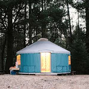 The yurt lit up at dusk!