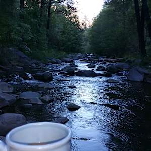 Morning coffee and contemplation on Oak Creek.