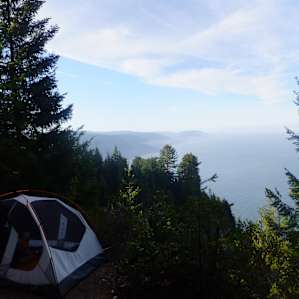 Fellow camper set up camp right on the bluff's edge. Most epic view from a camp site.