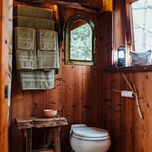 There's even a spotless "real" toilet in the Nest, along with immaculate towels.