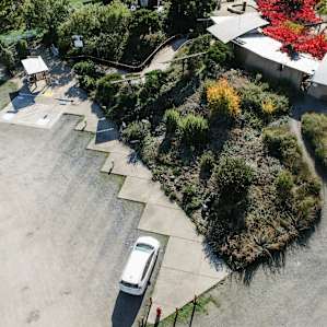 Aerial view of electric vehicle parking area.