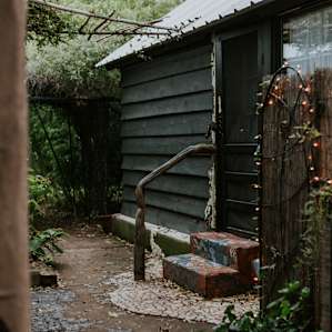 Beth did all that stone and tile work around the stairs, and made the railing, and soo much more all over the property.