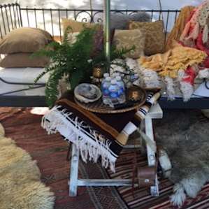 Again, we tried to re make the bed the way the owners had when we arrived, but come on how cute is this set up! There was even a smudge stick to burn and little waters - so cute.