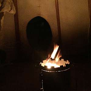 Fires in teepees keep things warm on cold nights