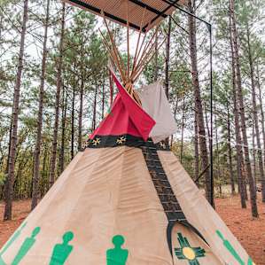 Tin roof built over the top of the Tipi to shield from the occasional rain.