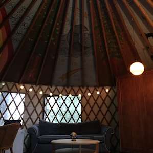 Well lit and relaxing space with the couch that also folds out to a bed if needed.