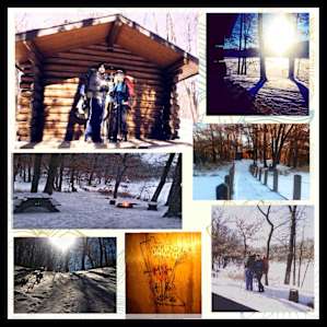 You'll stay cozy warm in this cabin , nestled in the woods of Lake Maria State Park . The cabins here are heated by a woodstove . There is no electricity but a solar powered light is available if you need it . It is a short hike with some inclines .
