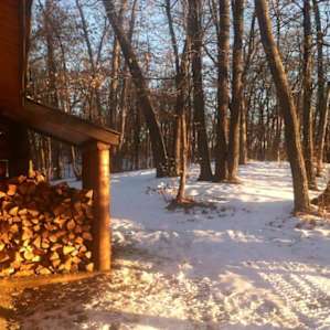 Firewood is cut and split , free of charge for the wood stove in the winter months . Be prepared to stoke the wood stove in the middle of the night to keep the chill away . Once stoked , you will be stripping your clothes though.