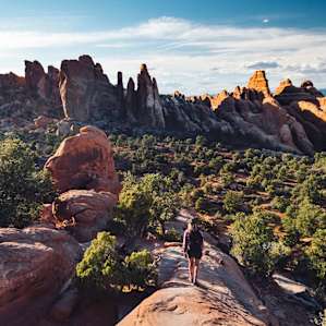 Day hiking to Double O Arch from Devils Campground.