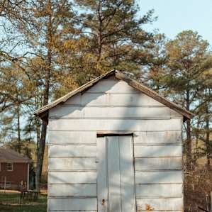 The exterior of the Crib. It sits on raised platforms to prevent flooding and maintain temperature.