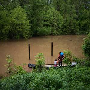 A canoe is resting ashore for your adventures.