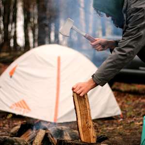 Preparing for a cool, early spring night at camp