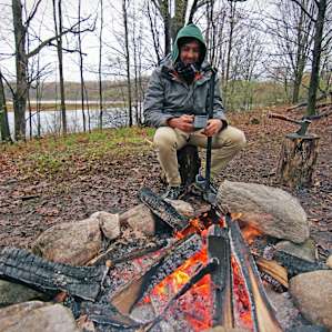Enjoying a warm cup of tea next to the fire