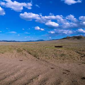 This is the road into the pasture/camping area from the road. It will be on your left, just after you see the first fire ring.