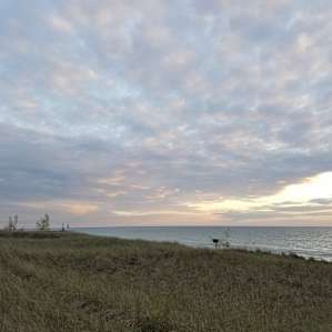View south along the Lake Michigan shore at dusk. 30 steps from campsite.