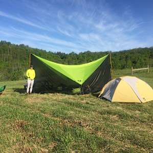Plenty of glorious space for our tent and tarp protection. There was a wooden picnic table and 2 benches to use for dinner preparations and unpacking/packing.