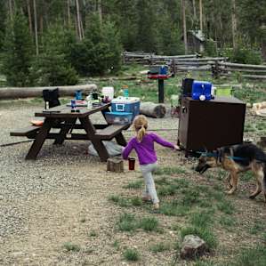 Campsites offer a picnic table, fire ring, bear box, and potable water throughout.