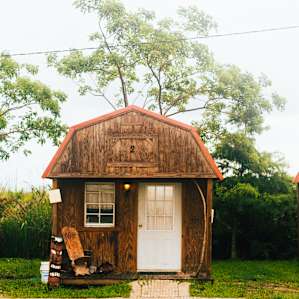 Here's my own little cabin with A/C microwave and a mini fridge!