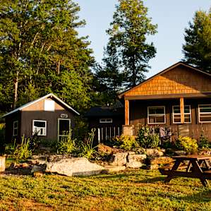 Cabin 1 sits closest to the community and parking areas.