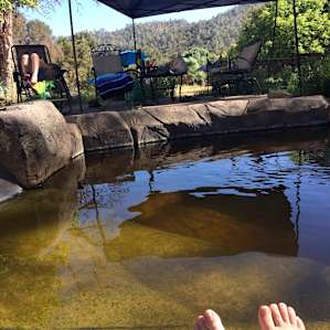 Relaxing by the natural pool.