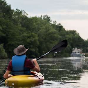 Kayaks share the canal with much bigger boats