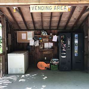vending area where you can buy snacks, ice, borrow a book or order pizza.