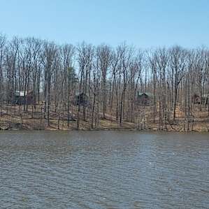 Cabins as seen from across Bear Creek Lake