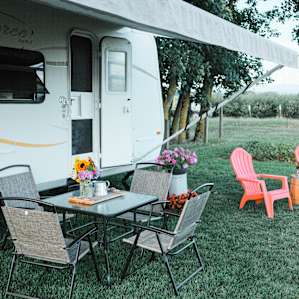 Plenty of chairs and tables for friends.