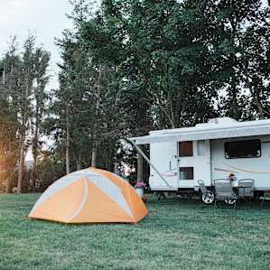 The yard around the camper is perfect for setting up a tent as well!
